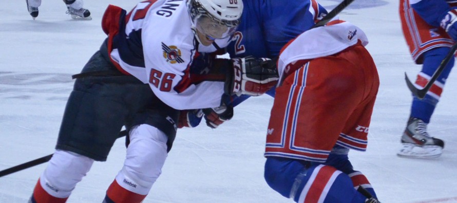 Spits Get First Home Win