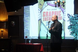 Dale Jacobs talks to an audience at Villains Beastro about his book Graphic Encounters: Comics and the Sponsorship of Multimodal Literacy Oct 17. (Photo by Chris Mailloux)
