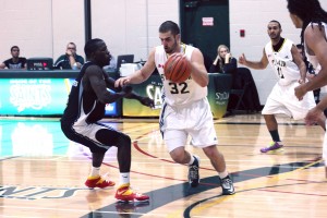 St. Clair College’s Alex Temesy (right) attempts to run by La Cite’s Daniel Gracia during a preseason game at St. Clair College Oct. 12.  The St. Clair College Saints won their first game of the preseason 71-63. (Photo By/Justin Prince)