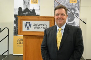 WINDSOR, ON.: Former Windsor-Tecumseh Ontario Liberal Party MPP and Minister of Finance Dwight Duncan poses in front of a podium in the CAW Student Center at the University of Windsor, Oct. 19. (Photo by/Richard Riosa)