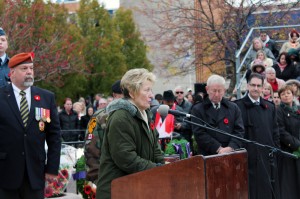 Teresa Charbonneau, speaks to the crowd gathered at the downtown Cenotaph on November 11 ( Dan Gray )