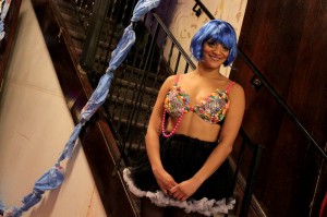 Jill Thompson, owner and designer of Bras By Jillish, models one of her own creations at the Heidelberg Project’s fall fundraiser ‘Encore’ held at a restored theatre space at 2952 Woodward Ave. in Detroit, Mi. (Photo By// Y. Murad Erzinclioglu)