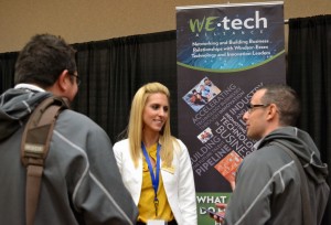 WINDSOR, ON.: Vice president of WEtech Alliance Yvonne Pillon greets visitors to her booth at the Windsor-Essex Tech Show held at the Giovanni Caboto Club Nov. 29. (Photo by/Taylor Desjardins)