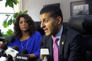 Mayor Eddie Francis, right, announces his resignation from office as wife Michelle Prince looks on during a press conference at City Hall Jan. 10. (Photo by Sean Previl)