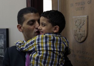 Mayor Eddie Francis and his son Phoenix, 4, after a press conference at City Hall Jan. 10. Francis told those in attendance of his decision to resign as mayor once this term was complete. (Photo by Sean Previl)