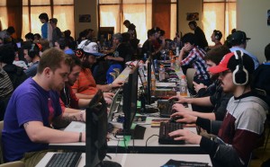 Multiple gamers at the No Man's LAN at St. Clair College's main campus play video games March 16, 2014. Players brought their computers to compete in game tournaments for prizes. (Kenneth Bullock/Converged Citizen)