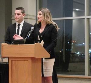 Second-year journalism students Mitch Whent (left) and Sarah Ryrie (right) kicking-off the night with an introduction speech at the Journalism Awards Night on April 3, 2014. These students were the hosts of the event and Ryrie was the event organizer. (Photo by/Shelbey Hernandez)