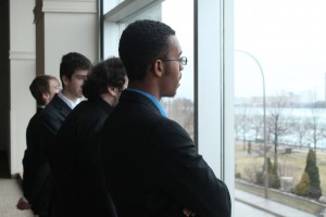 St. Clair College journalism students Aaron Sanders (front), Brett Quinn, Justin Prince and Kenneth Bullock enjoying the view of the Detroit skyline from inside the St. Clair Centre for the Arts at the Journalism Awards Night on April 3, 2014.