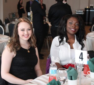 St. Clair College journalism students Lynette Tabor (left) and Iesha Coburn (right) are photographed at the Journalism Awards Night on April 3, 2014. (Photo by/Shelbey Hernandez)