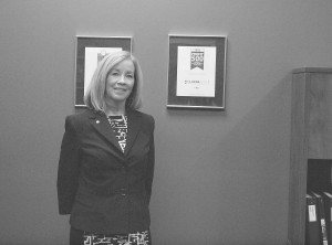 Maureen Lucas president and owner of LucasWorks poses in her office in Windsor on Sept. 24, 2014 (Photo by: Klay Coyle)