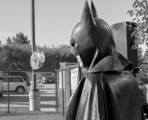 Ryan Charbonneau, "Batman," looks over the Superhero Run on Sept. 27 at Malden Park (Photo by Kristine Klein)