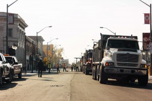 Construction workers lay down asphalt on Wyandotte near Walkerville on Monday, October 27, 2014 (Photo by Eugenio Mendoza)