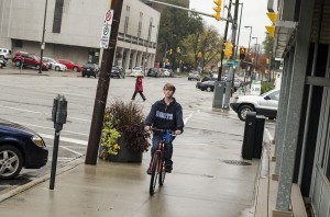 Journalism student Kenneth Bullock rides his bike to school on Oct. 31. (PHOTO BY/TECUMSEH MACGUIGAN)