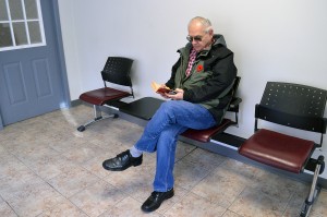 A patient waiting in the downtown clinic waiting room on Friday, November 7, 2014 (photo by Kassandra Coates)