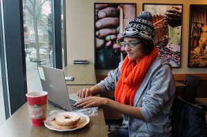 Cecilia Miller, 22, works towards her 50,000 word goal at a downtown coffee shop as a part of the National Novel Writing Month. (Photo by Ashley Ann Mentley)