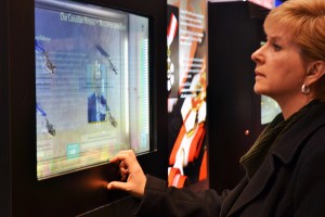 Natalie McFadden checks out an interactive display during the "It's an Honour" exhibit on Saturday, January 24,, 2015. (Photo By Allanah Wills)