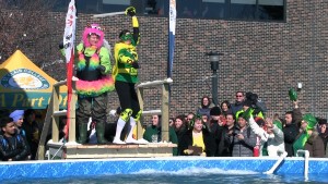 St. Clair nursing professor Margaret Rice and student Lisette of the Plunging Nurses team danced for the crowd before jumping in the icy water at St. Clair College in Windsor Thursday, Feb. 5, 2015. (Photo By/Taylor Busch)
