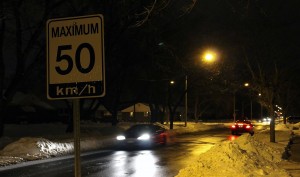 (As the province waits for the decision on lowering the speed limit, Windsorites drive down Dominion Boulevard at 50 km/h on Feb 3. Photo by Anthony Sheardown) 