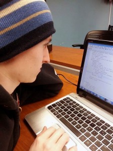 Brendan Steiner, a fourth year student in the computer science program at the University of Windsor, works on his coding skills in the computer science common room or “Java Lab,” at the University.