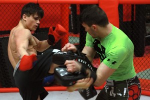 WINDSOR, Ont. (2/24/2015) T.J. Laramie (left) trains with Kyle Prepolec inside of the Maximum Training Centre located in Windsor. 17 year old Laramie will be going to Japan to be a cast member of a reality television show called Fight Xchange. Photo by Chris Mailloux
