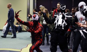 Toronto, Ont :: (3/21/2015) Two cos-players dressed as the Marvel comic book characters Carnage (left) and Agent Venom during the Toronto Comic Con, March 21. 