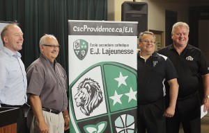 WINDSOR, ONT.: JULY 13, 2015 – (From left to right) Joe Picard, the director of education for the Conseil Scolaire Catholique Providence, CSCP chair of the board Robert Demers, École secondaire E.J. Lajeunesse principal Tom Couvillon and Windsor AKO Fratmen president and owner Mike Morencie pose for a photograph after holding a press conference at E.J. Lajeunesse in Windsor on July 13, 2015. (The Converged Citizen Photo by / Justin Prince)