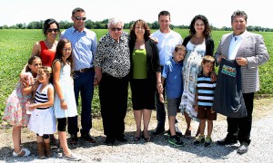 WINDSOR, ONT.: JULY 16, 2015 - Windsor Regional Hospital CEO David Musyj, right, joins the O'Keefe family at their farm at County Road 42 and Concession 9 on July 16, 2015. The farm has been chosen as the site of the 1.6 million square foot, 10-storey single-site acute care hospital for Windsor and Essex County. (The Converged Citizen Photo by / Sean Previl)