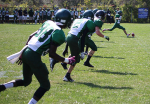 (Chris Raad takes the opening kickoff in the first ever home football game in Lajeunesse history on Thursday, September 24 at Lajeunesse. Riverside spoiled the home opener for the Royals with a final score of 25-12. Photo by Garrett Fodor)