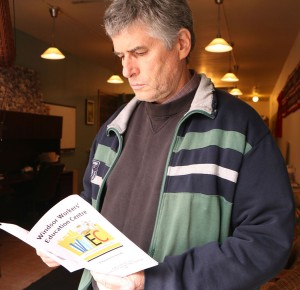 Windsor, Ont. (29/10/15)-board president Paul Chislett of Windsor Workers' Education Centre reviews in-house resources for workers on Thursday, Oct, 2015. Photo by Jillian Toman, Mediaplex News