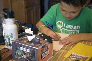 WINDSOR, Ont. (20/10/15) - Earth Ranger River Michalczuk, 10, writes thank you notes to people who donated to his Bring Back the Wild campaign at his home in Windsor on Tuesday, Oct. 20, 2015. Photo by Shelbey Hernandez, Media Convergence. 