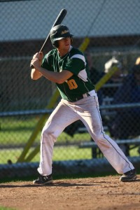 Jeff Watkin sets up for a pitch against Durham College at Lacasse park in Tecumseh, Ont. (Photo courtesy of St. Clair College)