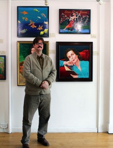 Mariano Klimowicz showcases his art for the Capricious Exhibit at the ArtSpeak Gallery in Windsor on Nov. 13. (Photo by Dawn Gray)