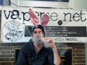 Mike Hart of Vape Me Vapables blows a cloud of vapour in his home office.