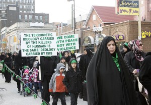 WINDSOR, Ont. (29/11/15) - People of the Shia Muslim Community of Windsor march to city hall as part of a rally commemorating the martyrdom anniversary of Imam Hussain, Nov. 29. Hussain was the grandson of the Prophet Muhammad. Photo by Kayla Wang, The Converged Citizen.
