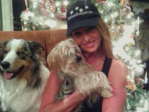 Debbie Loewens, owner of Four Wheels Four Paws, poses with her dogs Marble and Teddy in her home in Windsor on Dec. 15, 2015. She says it is too close to Christmas to adopt a pet now. Photo by Taylor Busch.
