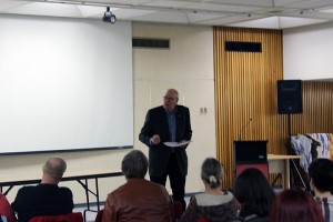 (WINDSOR, Ont. (04/02/16) : Former Toronto mayor John Sewell addresses a crowd at the at Windsor Public Library Central branch in Windsor, Ont. on Thursday, Feb. 4,2016. Photo by Aaron Sanders.