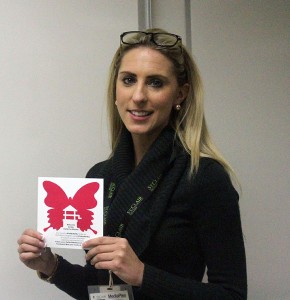 Yvonne Pilon shows her support for the #pinkbutterfly campaign while at the MediaPlex on March 4. Photo by Dawn Gray