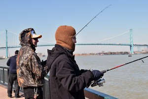 Local fishermen take advantage of a sunny spring morning fishing along the Detroit River on April 15, 2016. Temperatures are expected to reach a high of 20 degrees Celsius over the weekend. (Photo by Fabricio Rivera-Paz)