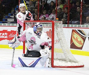 Windsor Spitfires goaltender Michael DiPietro wears a special jersey for breast cancer awareness during ‘Pink in the Rink’ at the WFCU Centre. (Photo by Todd Shearon)