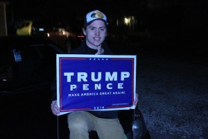 A Windsor citizen poses with his Trump sign in contentment of the results with the American election. (Photo by Vanessa Cuevas) 
