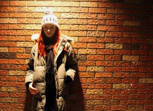 Katie Durham outside of a Tim Hortons on Ouellette Ave. (Photo by Kylie Turner)
