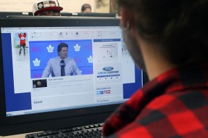 Noah Gecelovsky browses the homepage of the Toronto Maple Leafs while at the MediaPlex in downtown Windsor. (Photo by, Cody Rusan) 