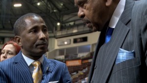 WINDSOR, ON (April 5, 2017) -- Windsor Express Executive Dartis Willis converses with partner Dr. Michael Wood before the Express play the Niagara River Lions at the WFCU Centre [Photo and cutline by Jeremy James Fokuoh]