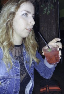 Emily Smith enjoys a drink to celebrate graduating from the University of Windsor nursing program. She said women judge each other on how they look and dress when out at clubs and expects that others will judge her for how she looks. (photo by David Lafreniere)