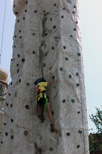 Sloan Menard climbing the outdoor rock wall with Windsor Rock Gym. (Photo by Vanessa Cuevas)