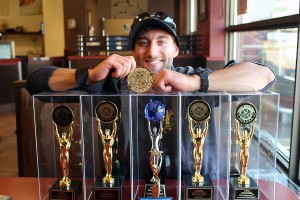 Matthew Luppino showing off his many awards in Windsor on Sept. 26,2017