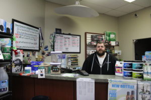 Portrait of Urban GreenHouse Owner James Marcoux in his store.