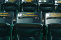 Staff, students and alumni participate in the Acumen Stadium personal-seat program
